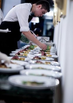 staffs preparing food plates